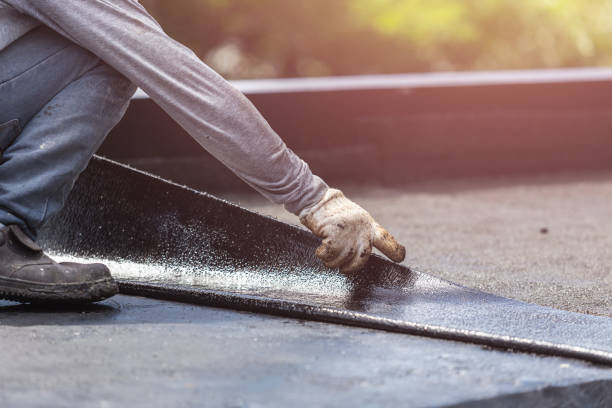 Professional Waterproofing technician working in Shirley, NY